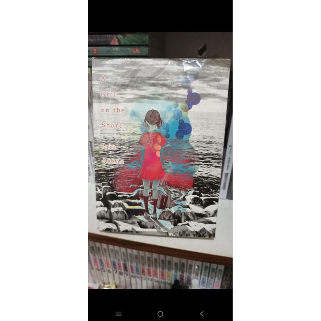 komik a girl on the shore import b. Inggris