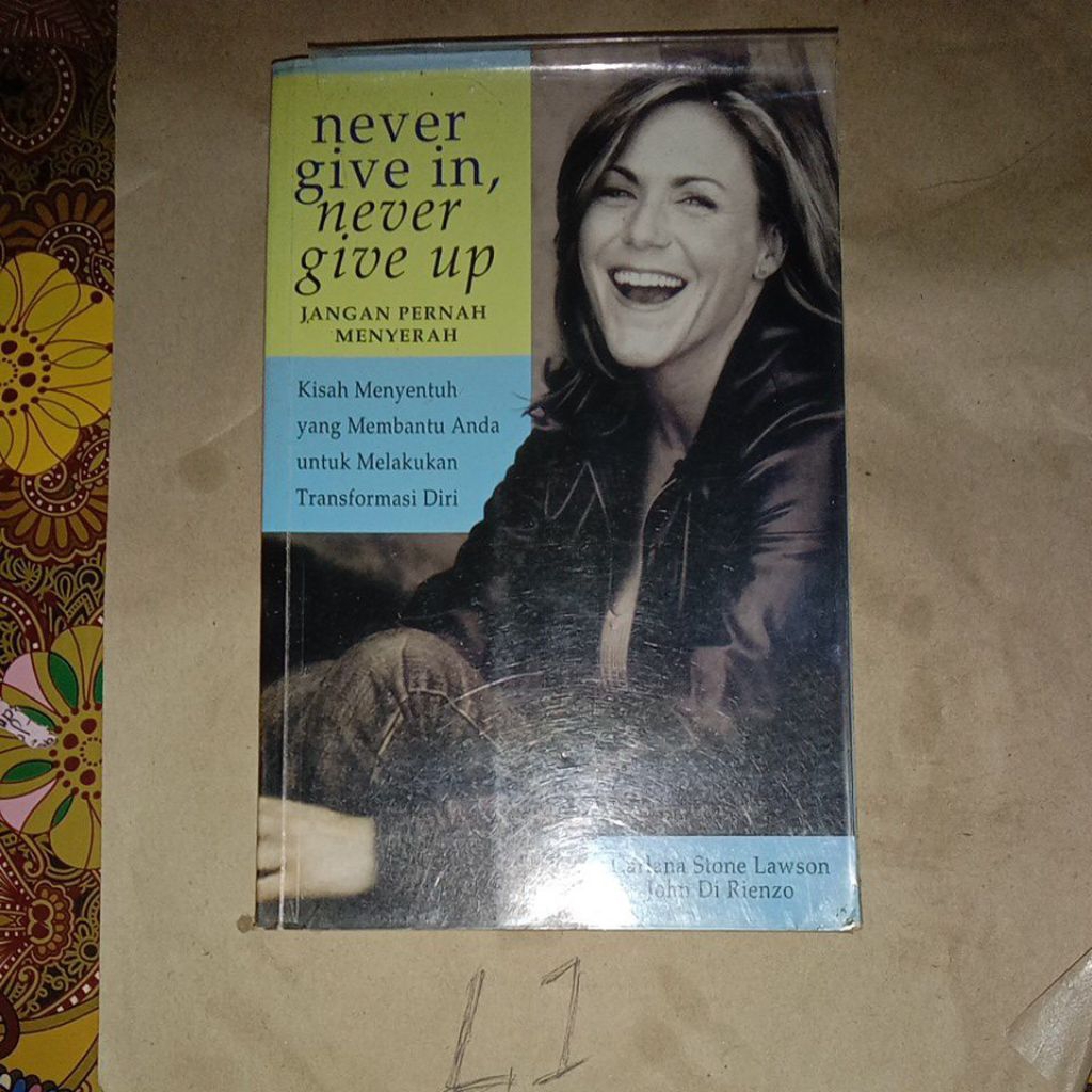 BUKU NEVER GIVE IN NEVER GIVE UP