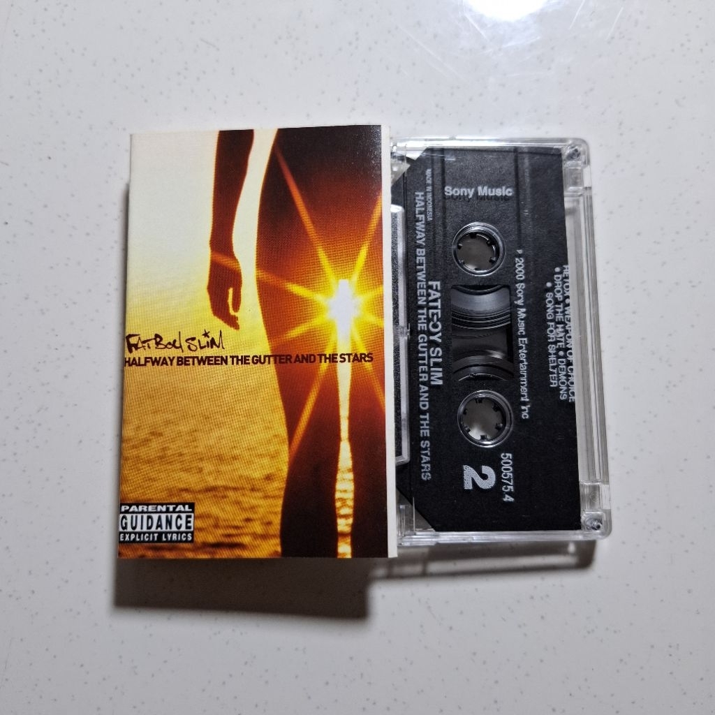 Kaset Pita Fatboy Slim - Halfway Between The Gutter And The Stars