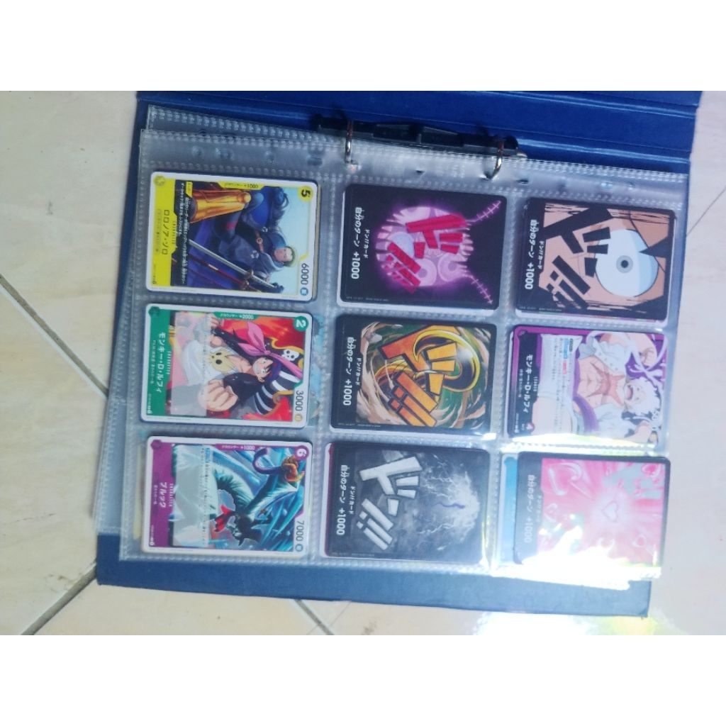 binder tcg dan isinya