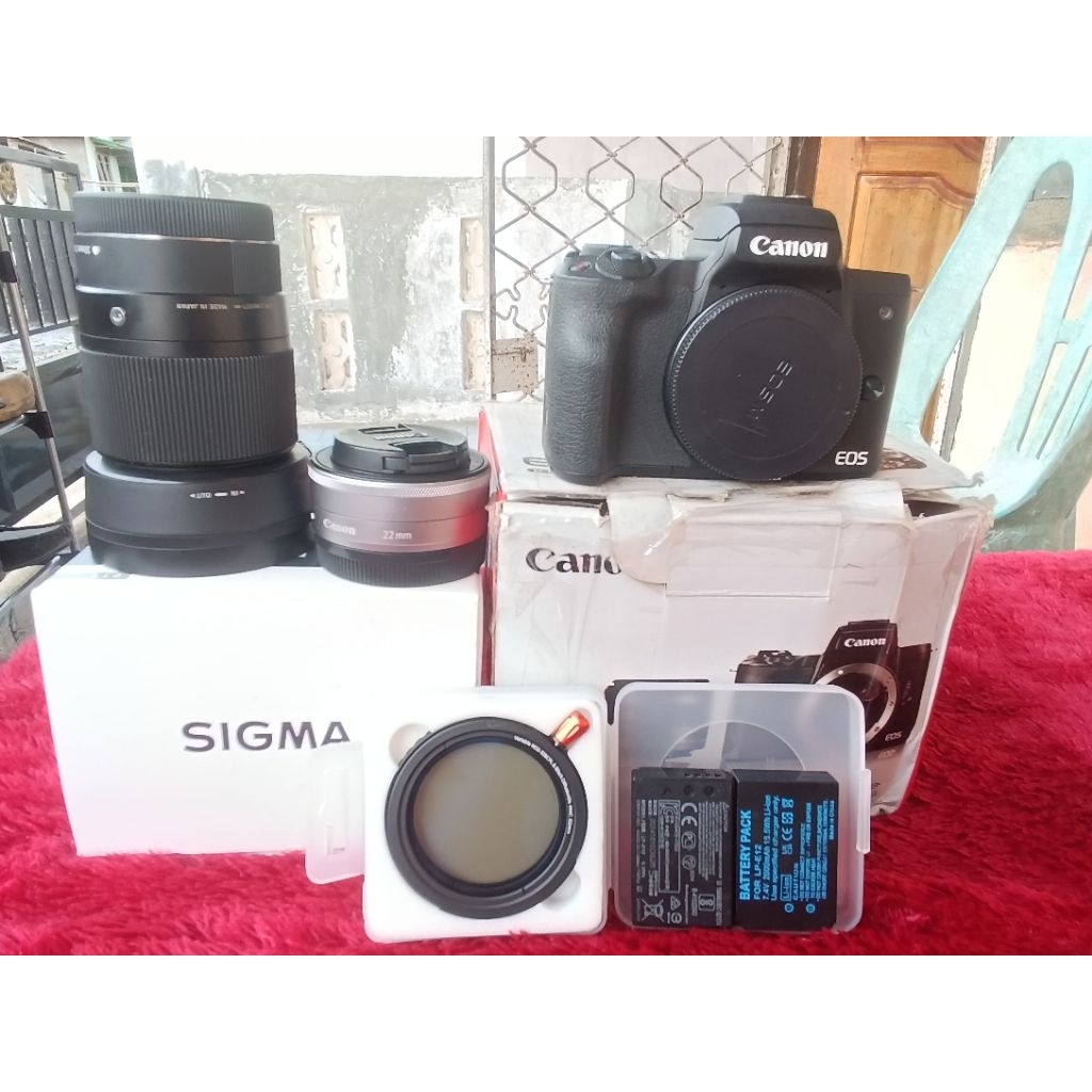 canon m50 bekas berkualitas + lensa sigma 30mm f1.4 + lensa canon 22mm f2 + nd filter  + slicon