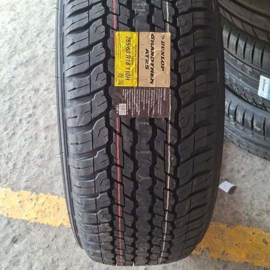 BAN TUBLES TIPE DUNLOP GRANDTREK 265 60 R18 BAN PAJERO FORTUNER HILUX DLL.