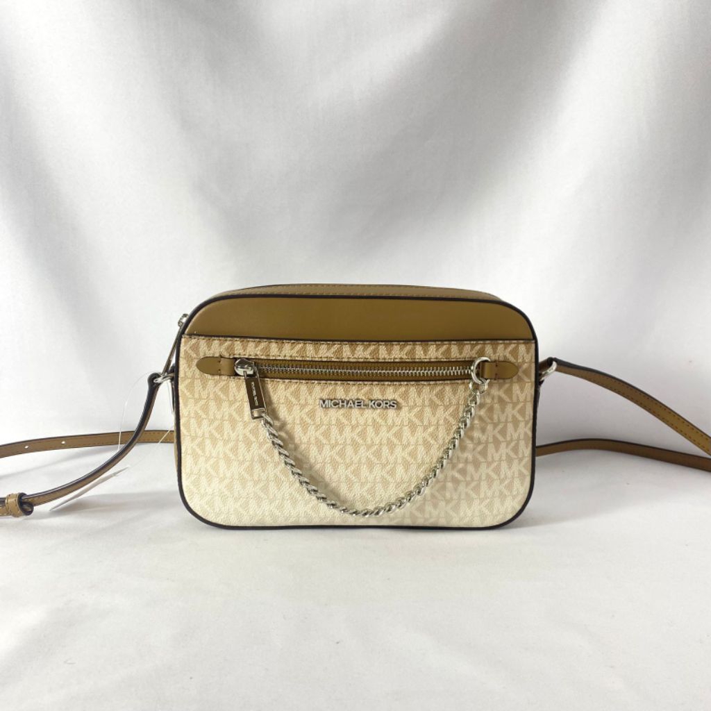 Mk jet set item lg ew zip chain xbody husk brown mlt