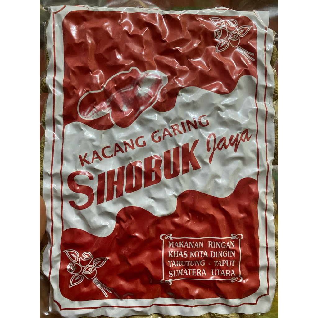 

Kacang Garing Sihobuk Jaya 1000gr / Makanan Ringan Khas Kota Dingin Tarutung Taput Sumatera Utara / Oleh Oleh Khas Sumatera