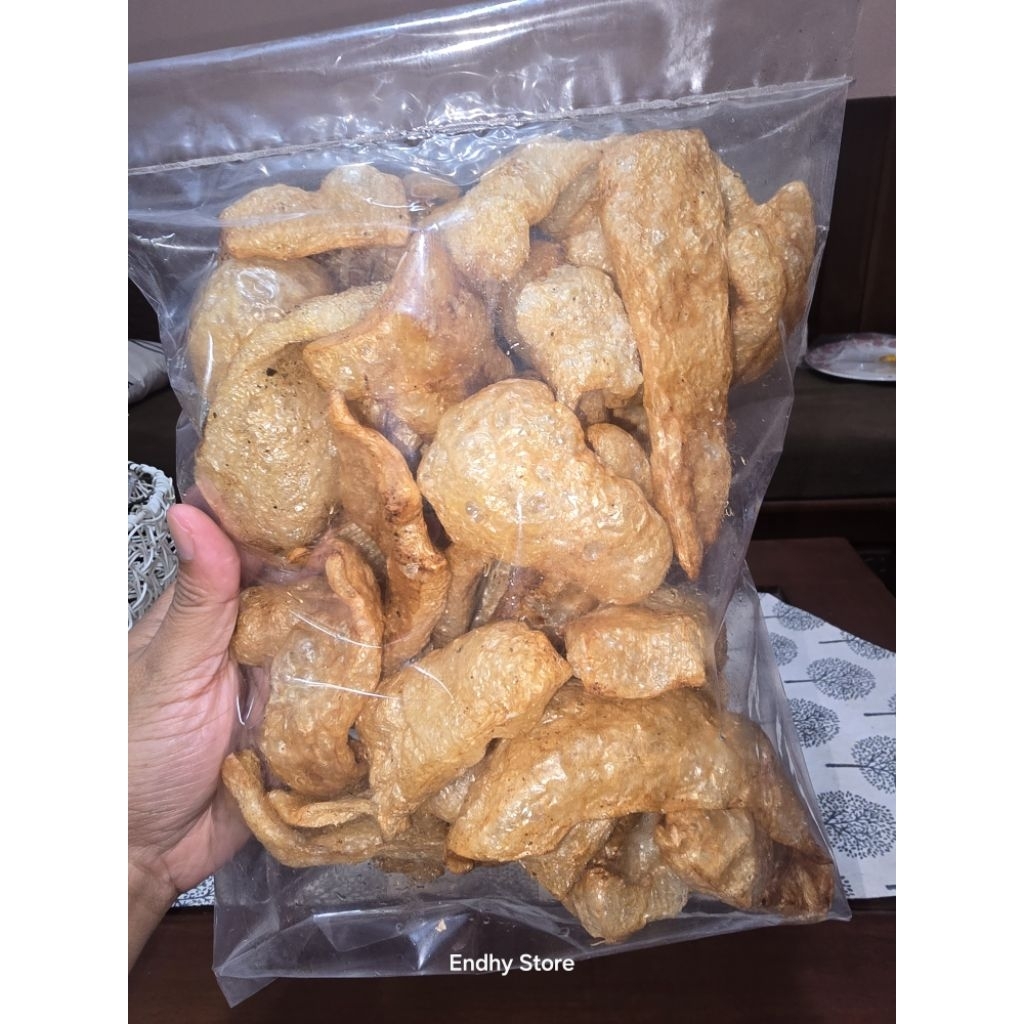 

KERUPUK KULIT KERBAU KEMASAN 100GRAM