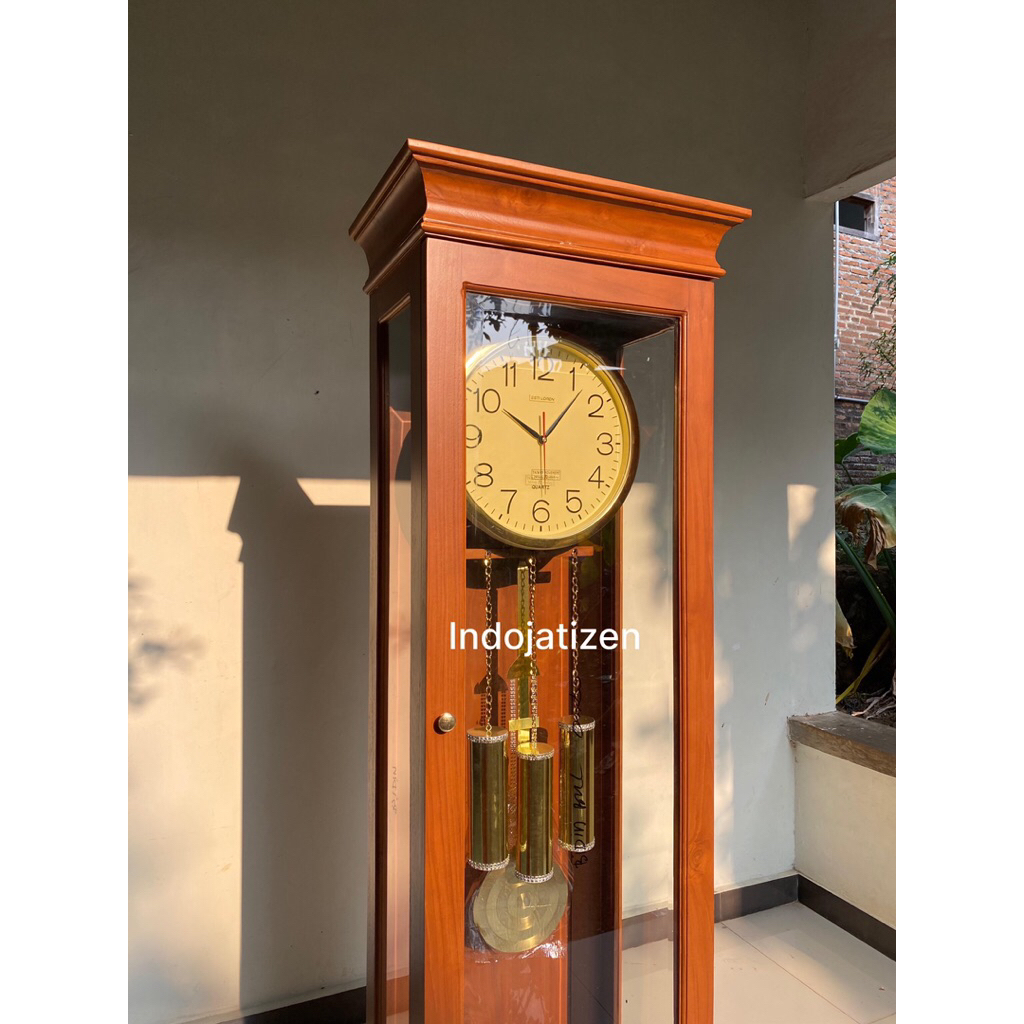 lemari jam minimalis kayu jati