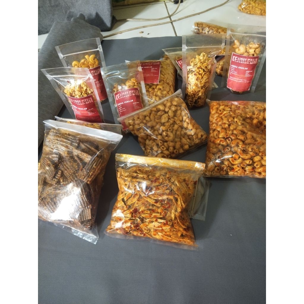 

kerupuk jengkol pedas daun jeruk bumbu melimpah/original daun jeruk 50gr