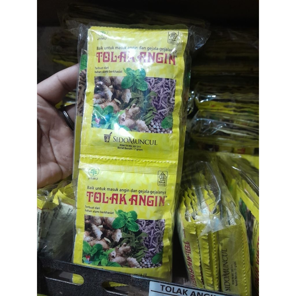 

jamu serbuk tolak angin cap sidomuncul original isi 10 saset