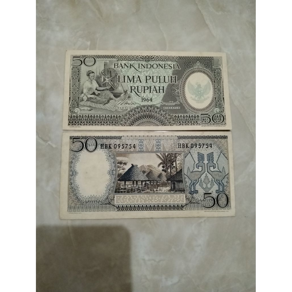 50 rupiah seri pekerja bagus asli