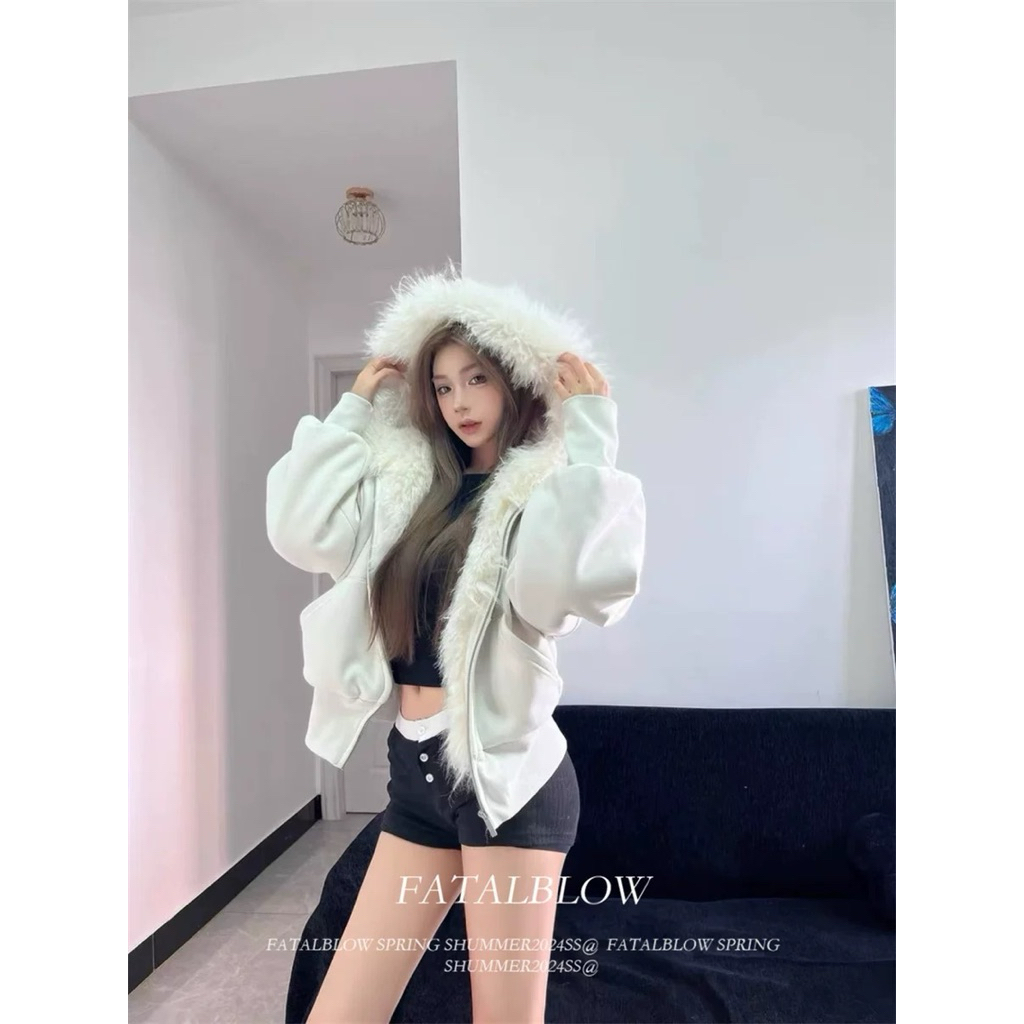 Christian fur sweater