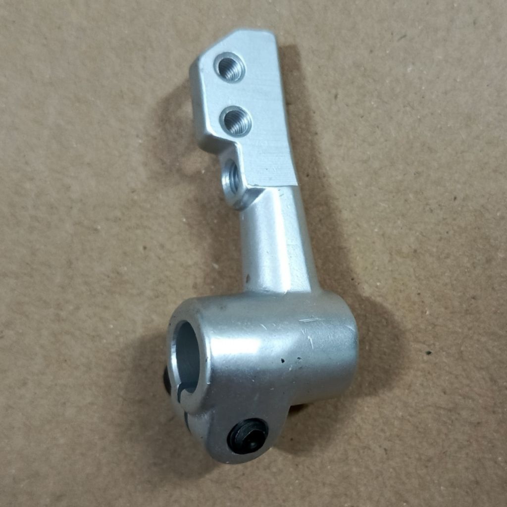 dudukan loper Looper mesin obras brother 551