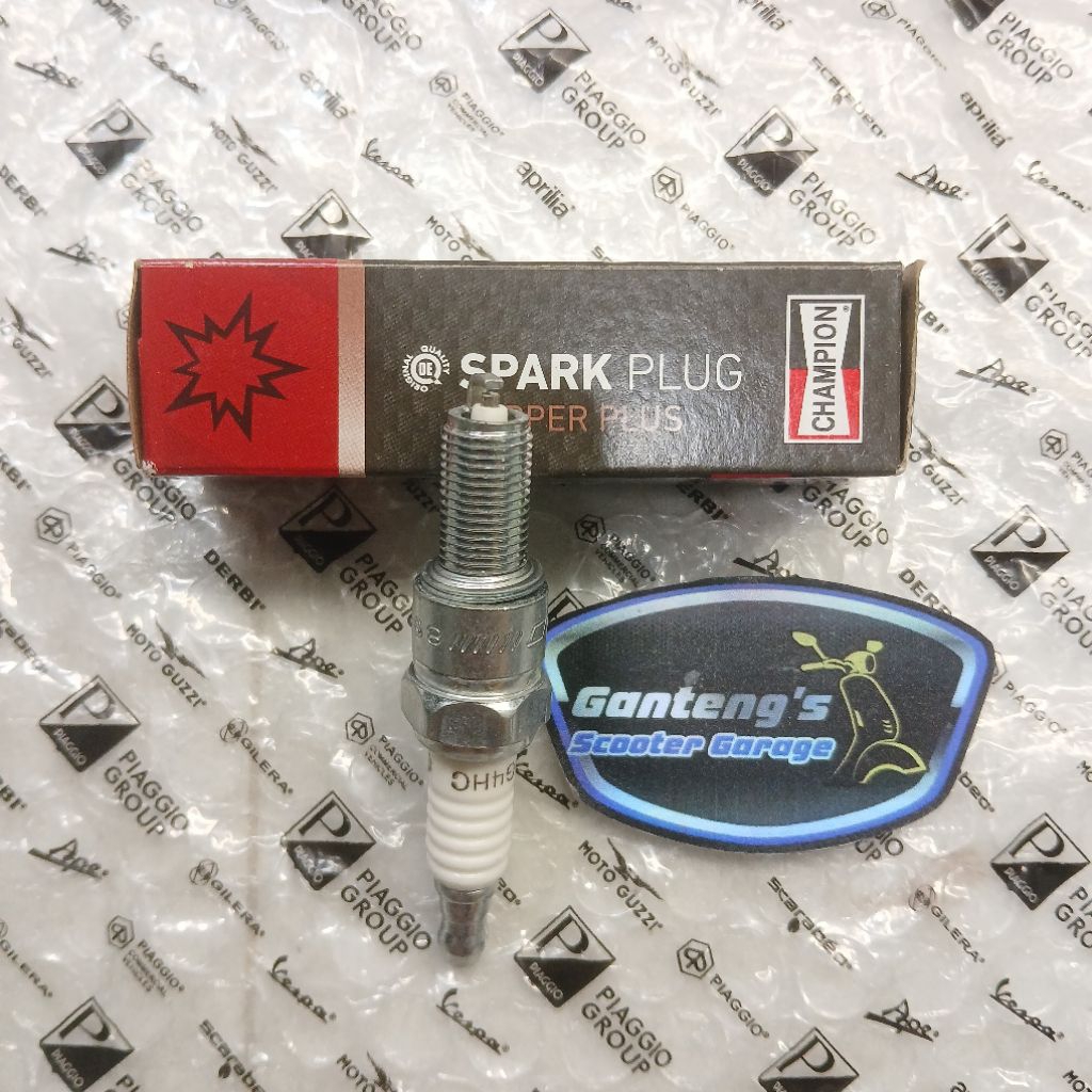 Busi  Piaggio Zip 100 - Liberty 100 - LX 125 karbu Champion RG4HC Original