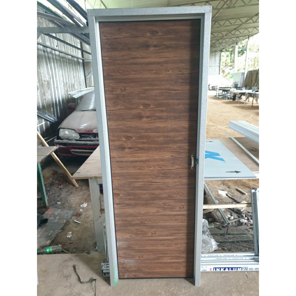 Pintu Kamar Mandi Kusen Bajaringan Daun Plavon pvc.
