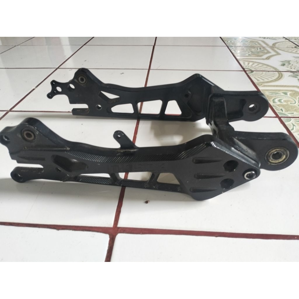 swing arm CNC motor listrik.