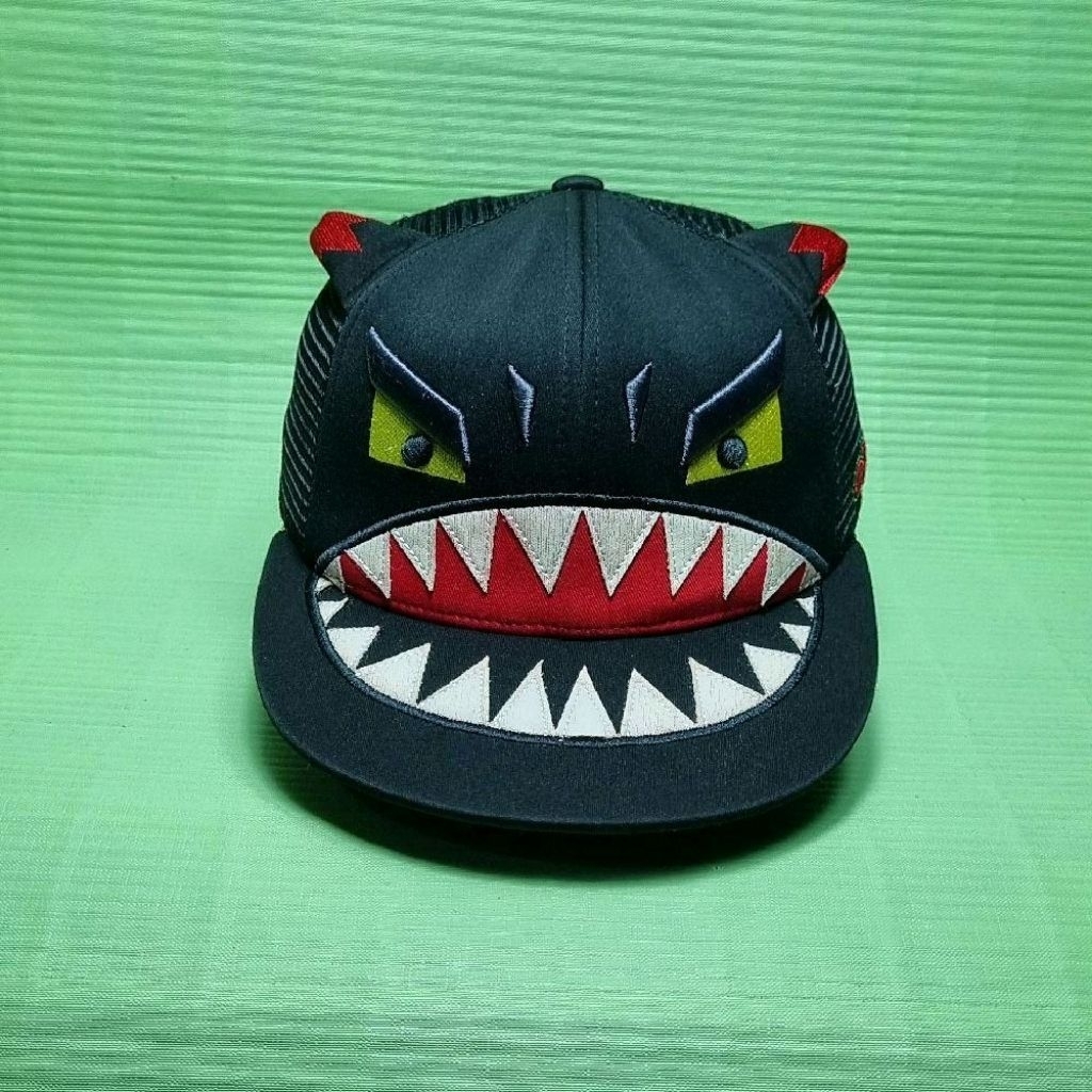 topi elstinko ebony jaring