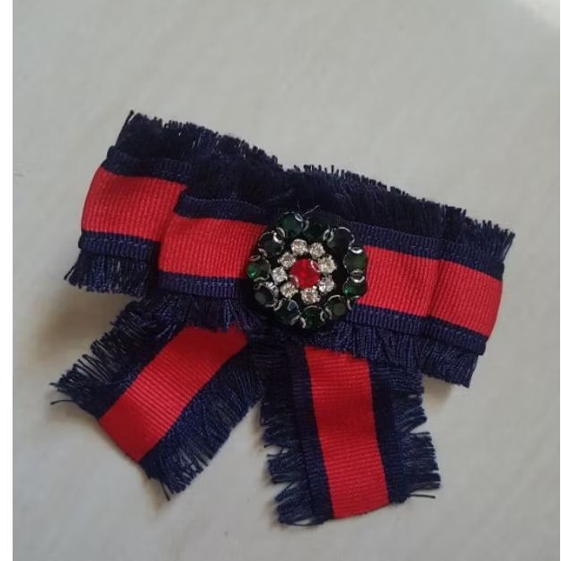 bros pin pita import branded aksesoris baju tas topi