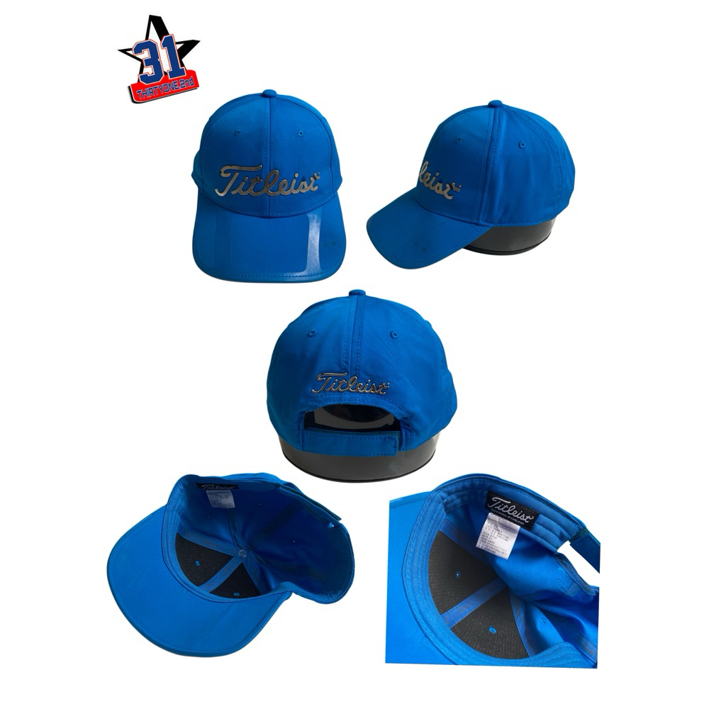 Topi running titleist