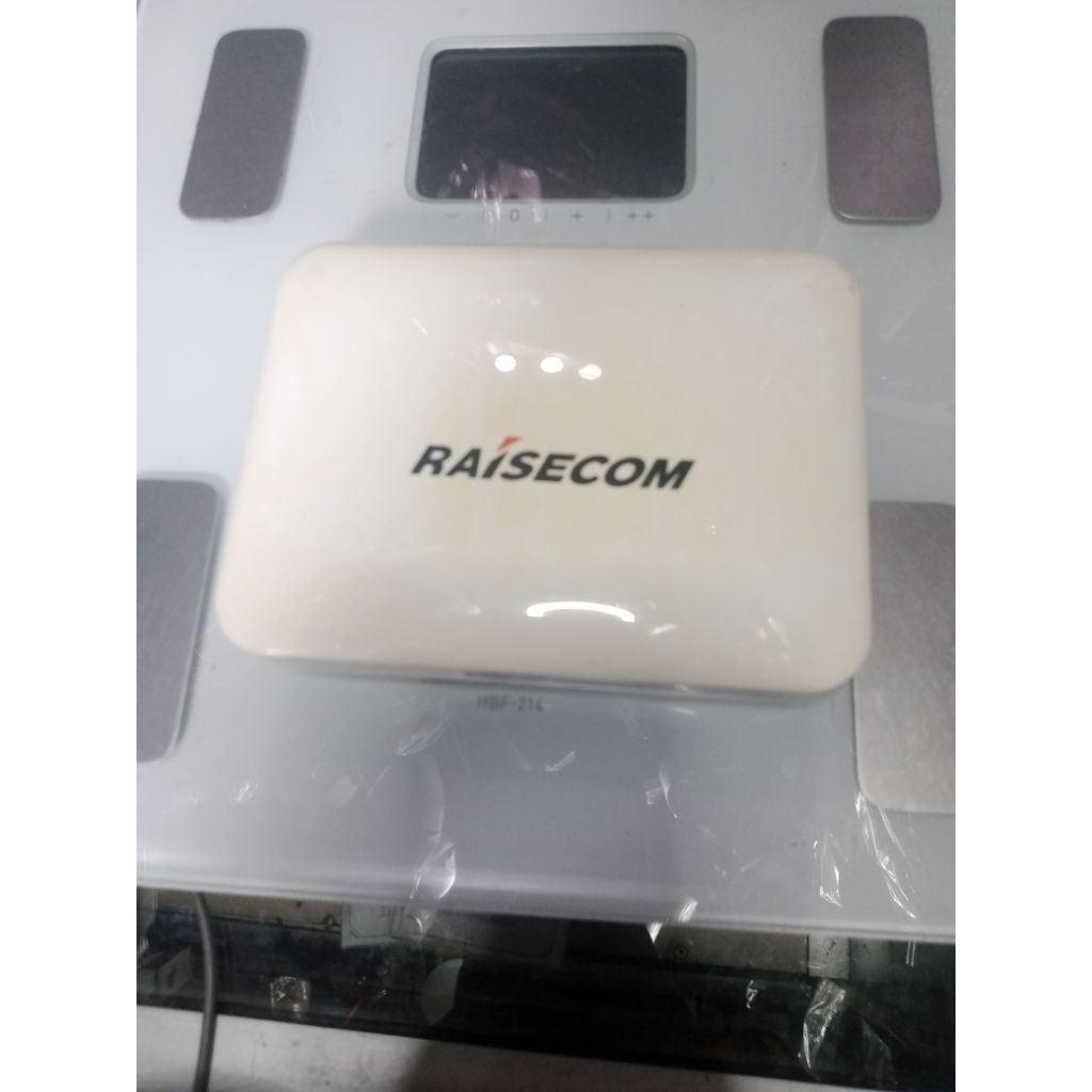WiFi Raisecom Pon Hijau HT803G-XX Second Normal ( unit agak kuning )