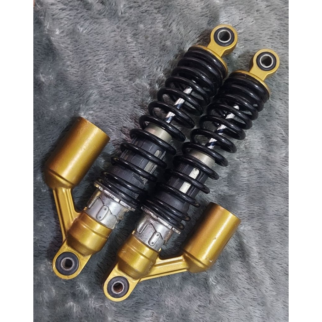 Shock Tiger Revo original bawaan motor