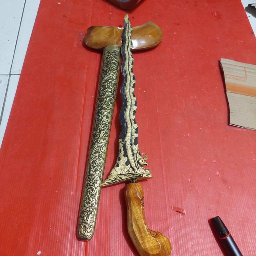 keris nogo liong kinatah