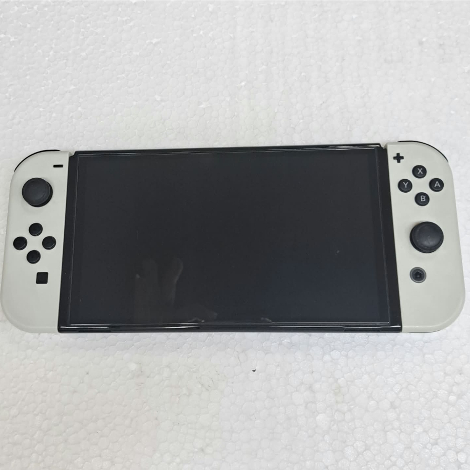 Nintendo Switch Oled second tab and joycon