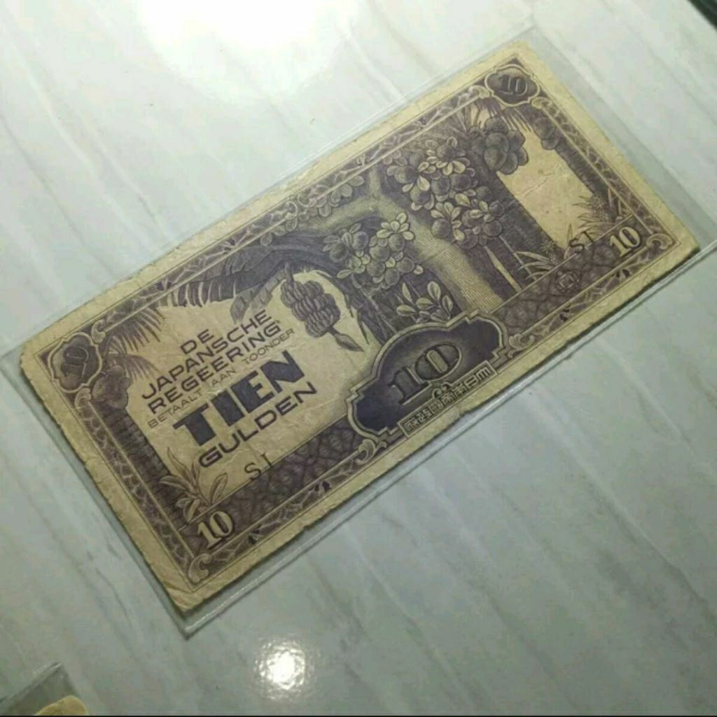 PROMO 10 GULDEN TAHUN 1942 ERA JEPANG DJR KOLEKSI KERTAS KUNO MURAH BANYAK DICARI KOLEKTOR