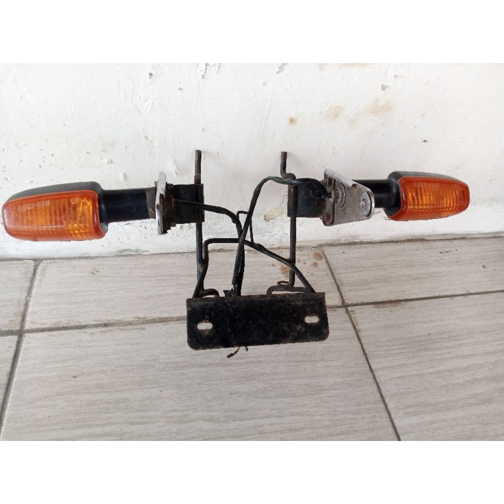braket pangkon lampu honda megapro primus original