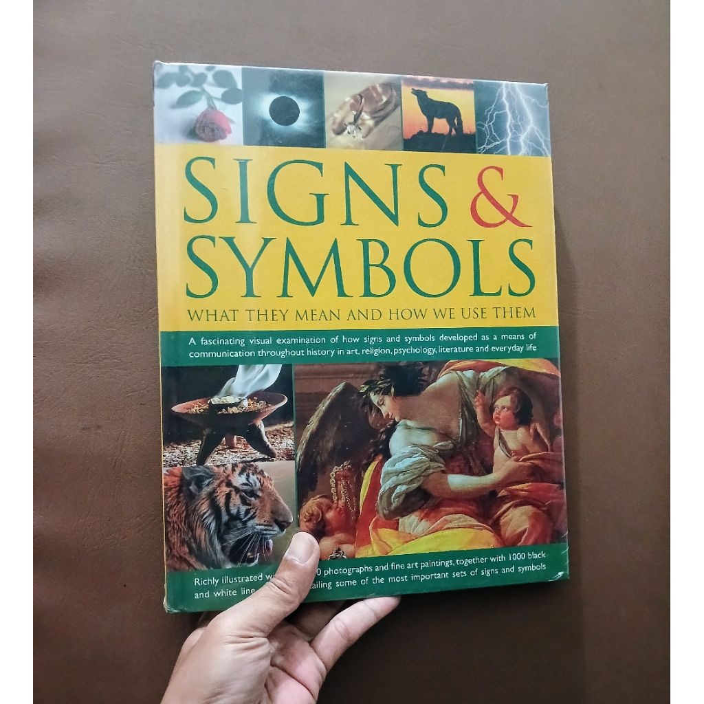 Signs & Symbols: What They Mean and How We Use Them 