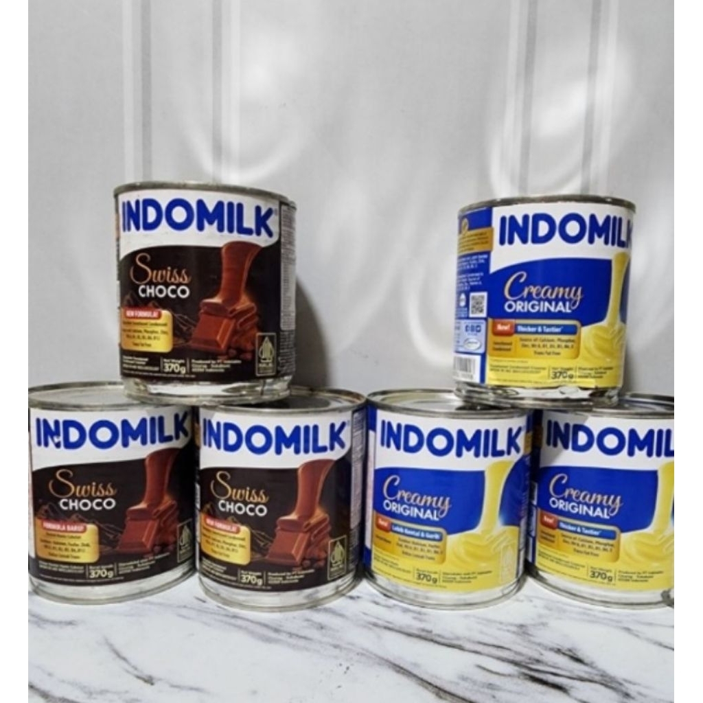 

Indomilk Susu Kental Manis Coklat # Indomilk Susu Kental Manis Putih # Swiss Choco Kaleng 370gr