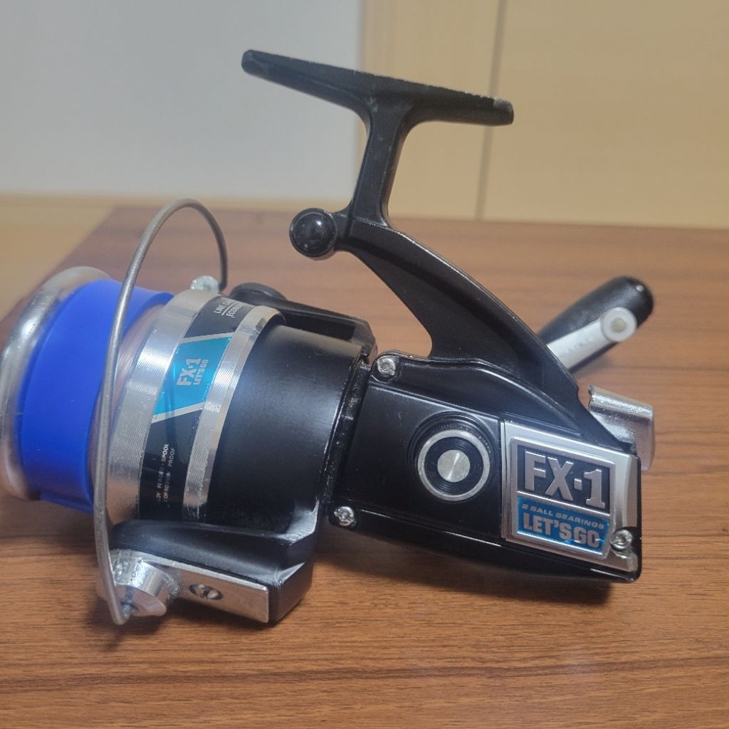 reel spinning olympic let's go fx-1 (ol-24)