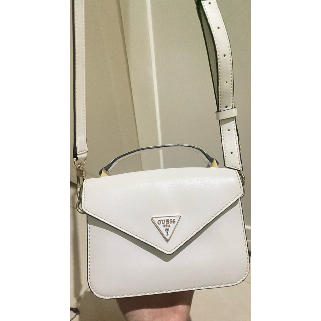 Preloved sling bag guess corina original