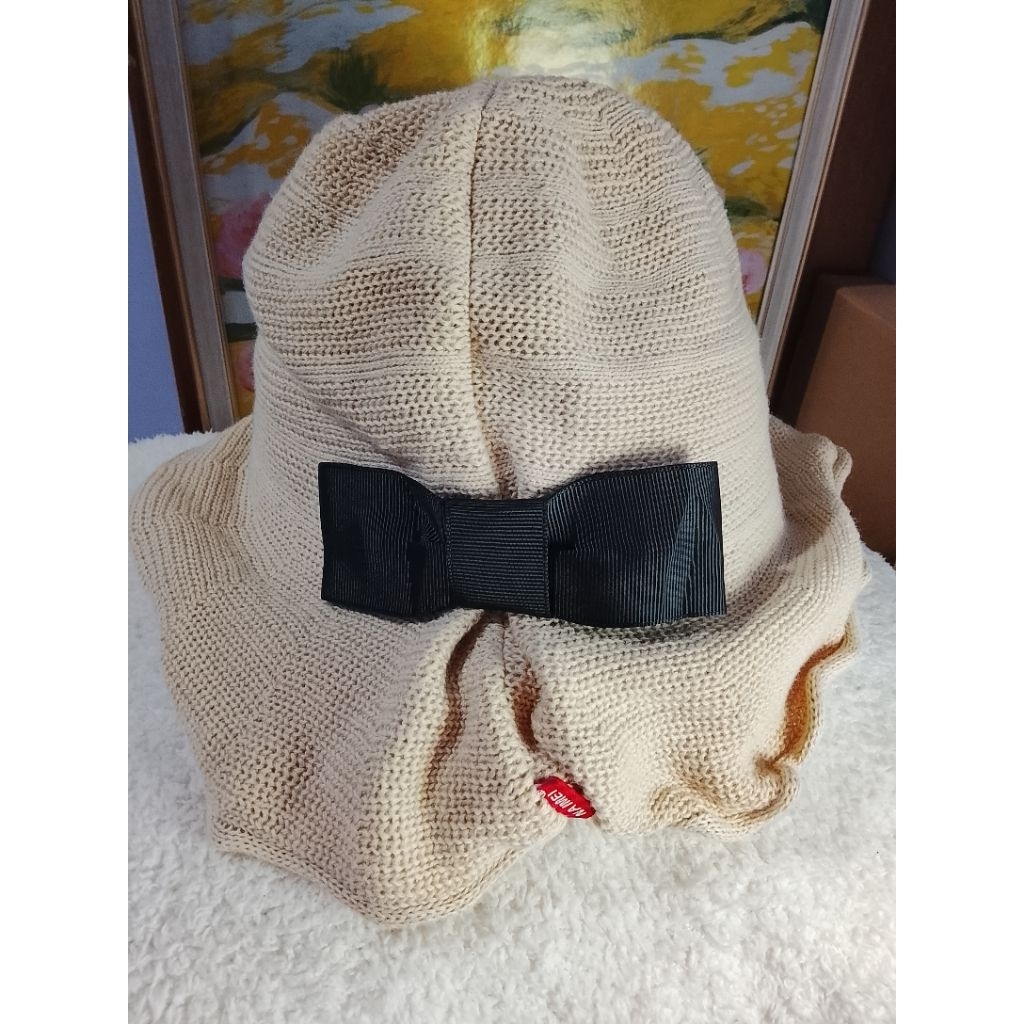Topi bulat pita wanita warna cream