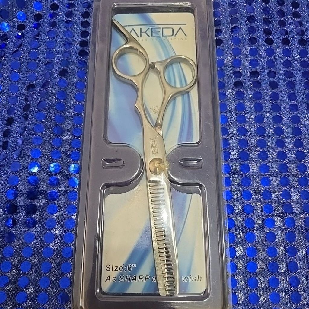 Gunting potong merk Takeda