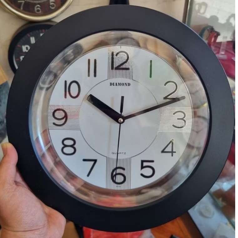 jam dinding sweep diamond transparan