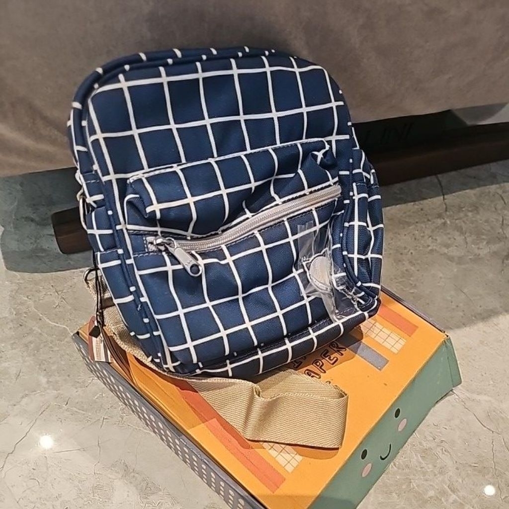 Little Munya mini sling diaper bag