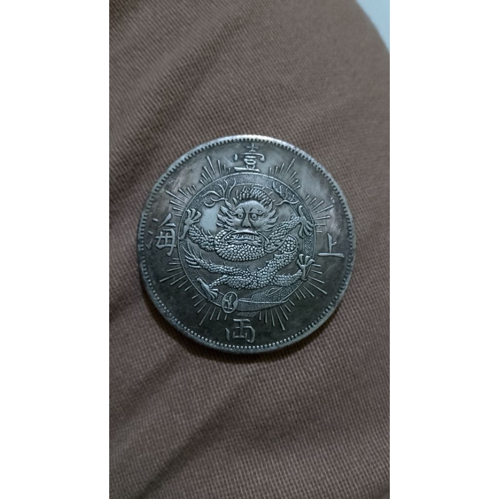 koleksi kecil koin naga naga