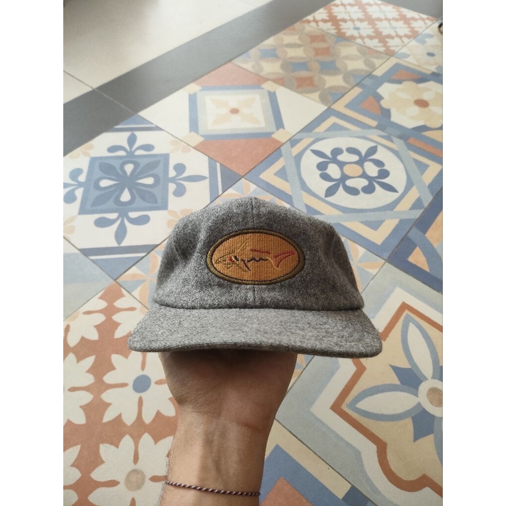 TOPI VINTAGE GREG NORMAN