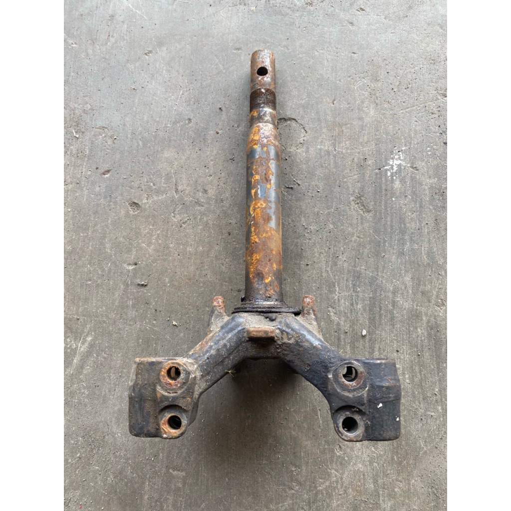 T segitiga shock depan karisma original copotan