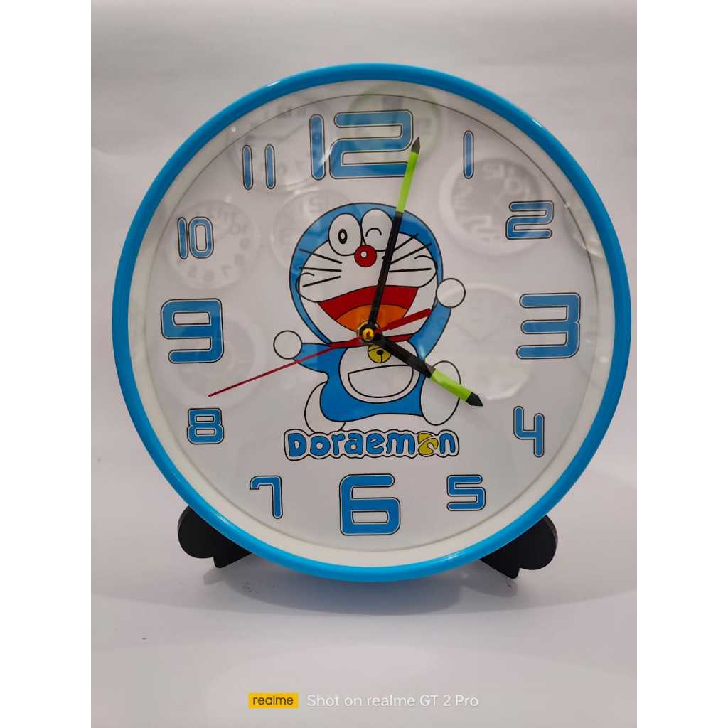 jam dinding ogana / jam dinding GLOW IN THE DARK / jam dinding doraemon / jam dinding biru / jam din