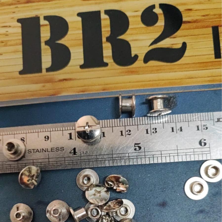 Baut Jilid buku 4 mm (obeng plus) warna silver nikel 1 pcs tinggi selinder 4 mm diameter 5 mm