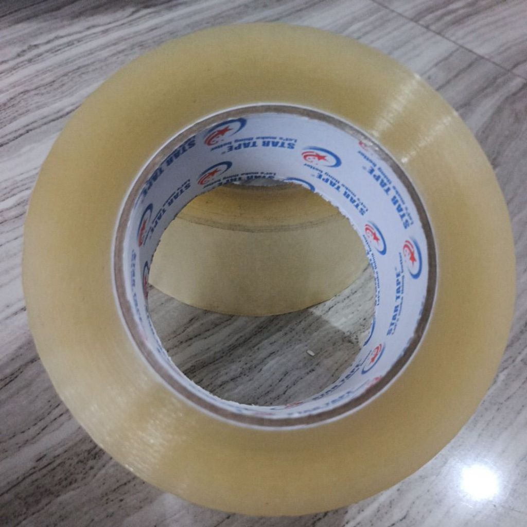 lakban jumbo bening 300  yard 48 mm  1 pcs star tape