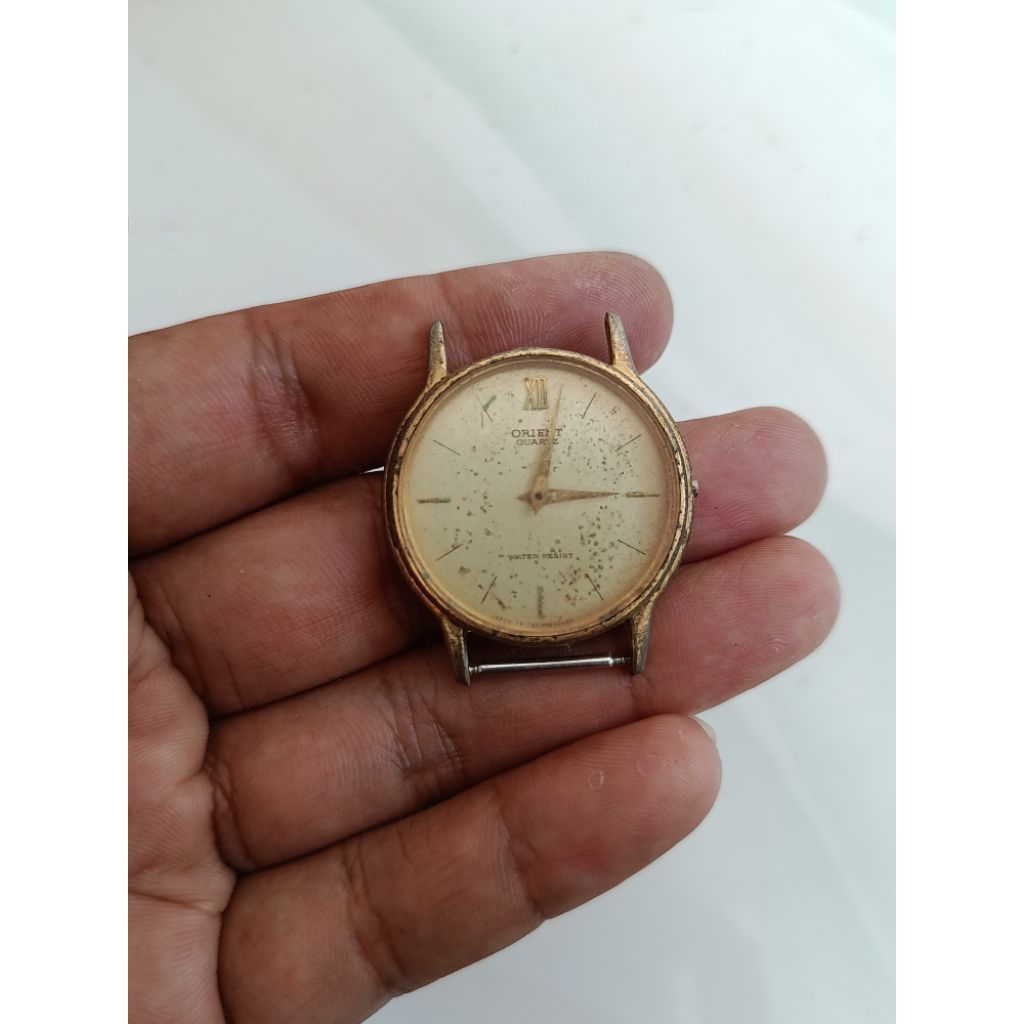 bahan jam orient quartz