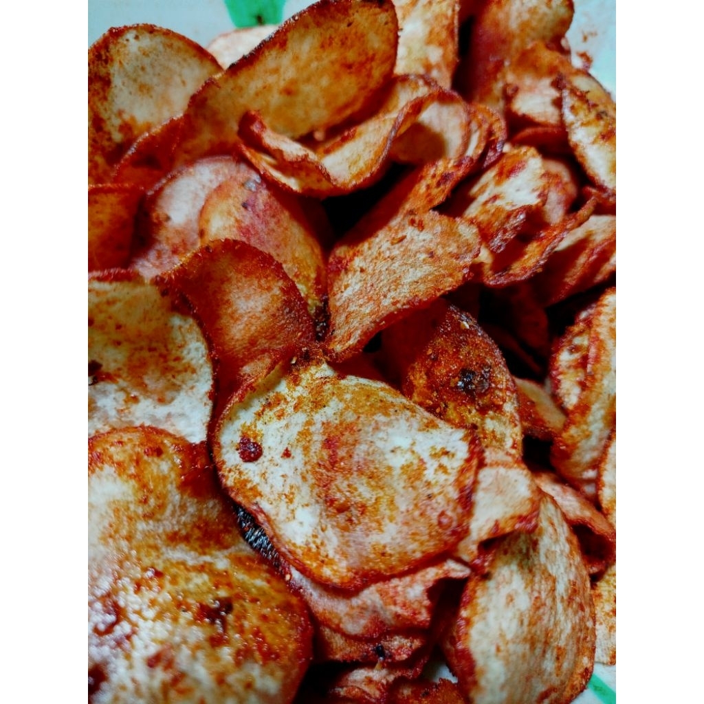 

Keripik Talas Daun jeruk Gurih Pedas Nampol Kemasan 250 gr