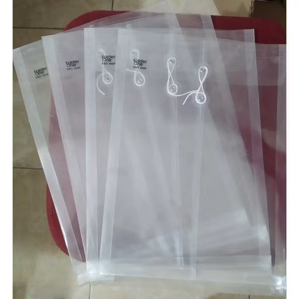 

Folder One - Map Tali Plastik Ukuran Folio Transparan ( Lusin )