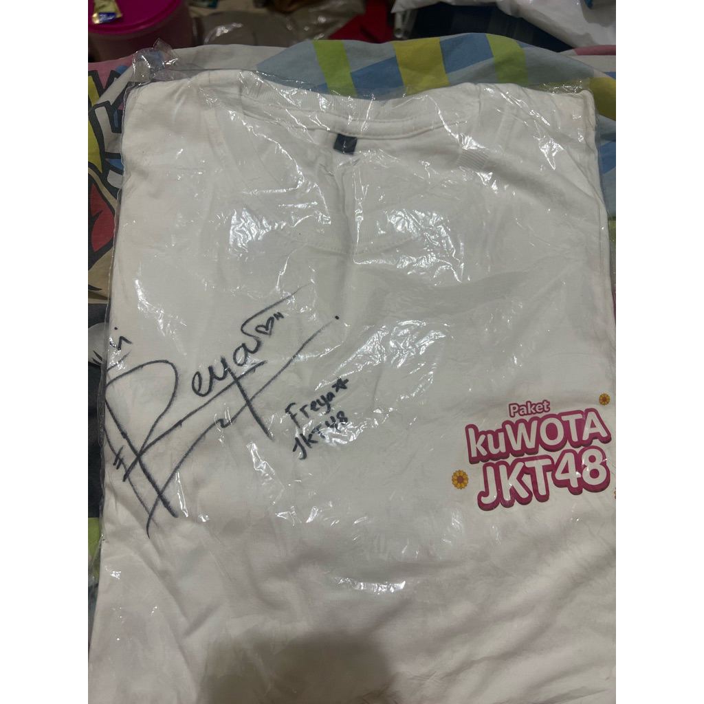 kaos telkomsel x jkt48 ttd Freya