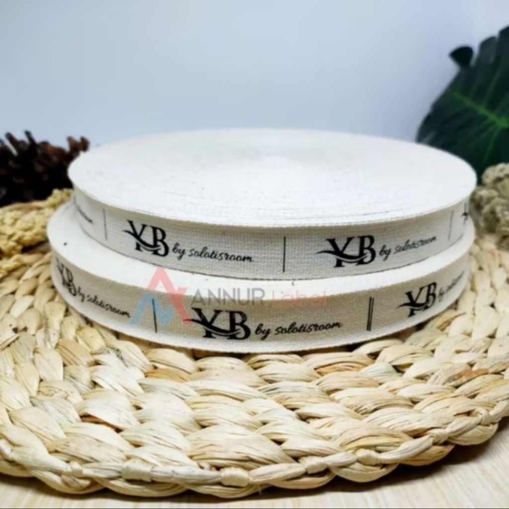 

Label Katun Jahit Custom Nama / Logo – Cetak Label Bahan Cream 1 Warna