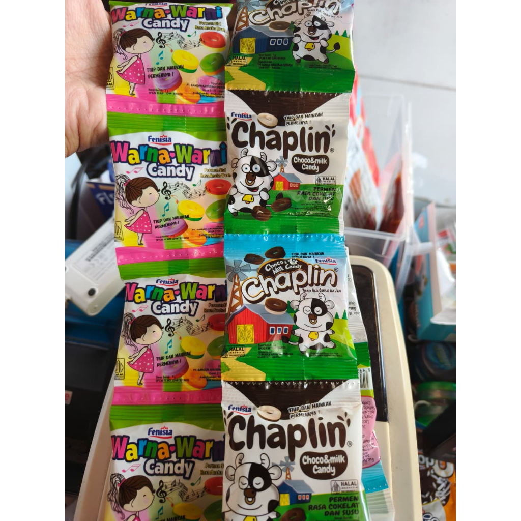 

(1 RENCENG = 10 PCS) PERMEN SIUL PELUIT JADUL FENISIA CHAPLIN