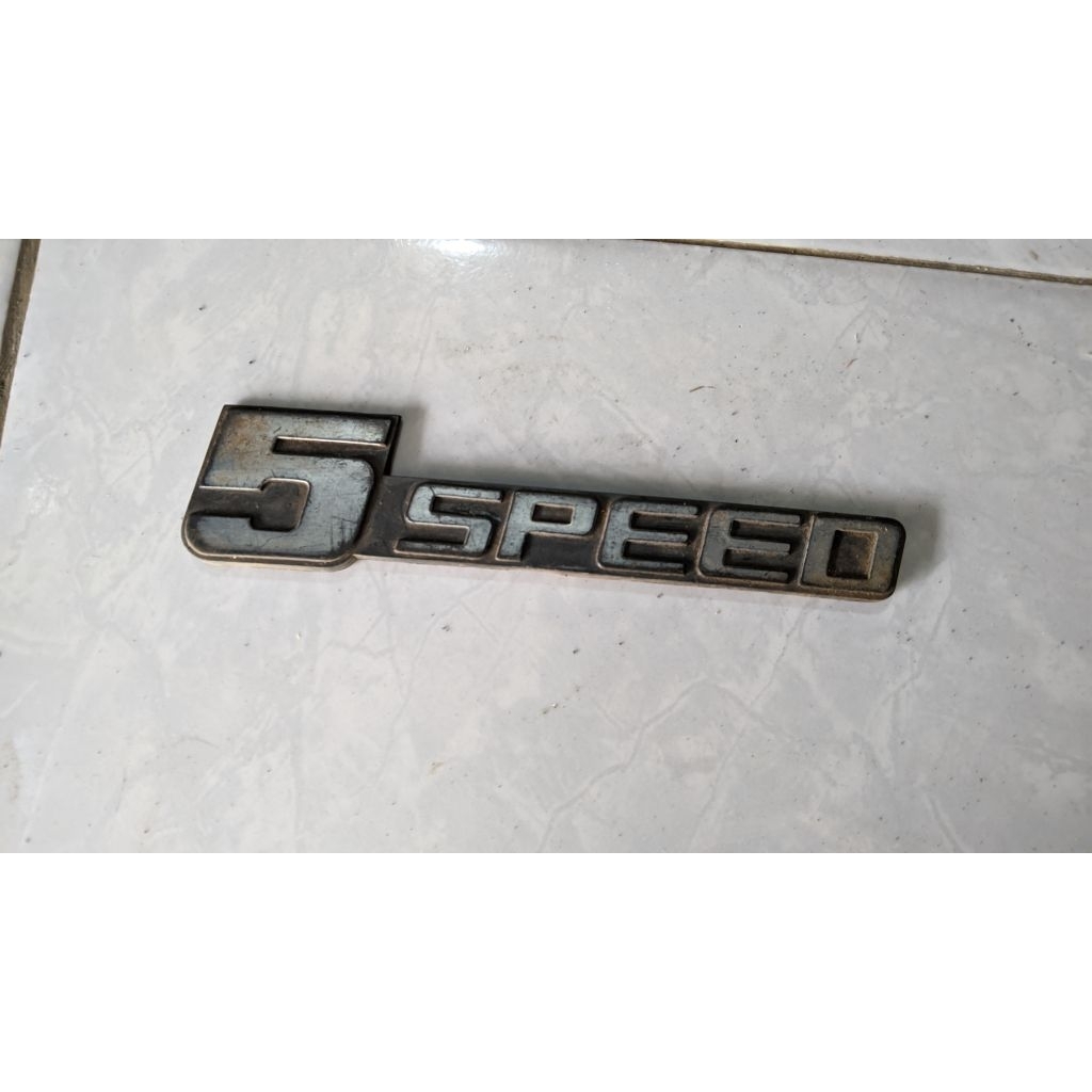 emblem 5 speed