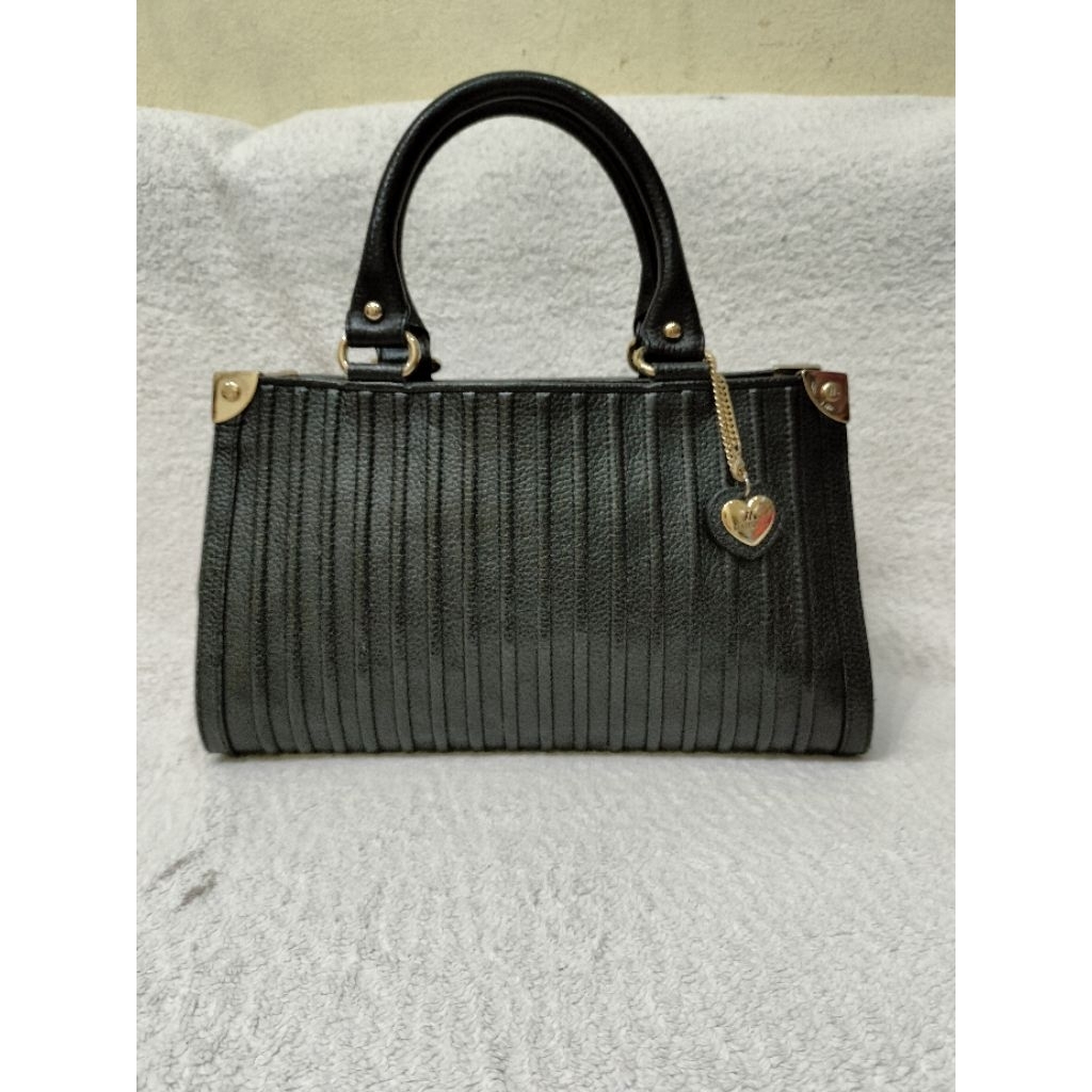 tas pesta kulit asli