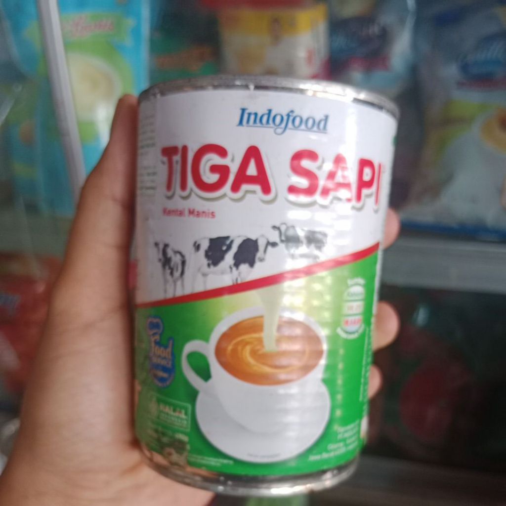 

susu kaleng kental manis cap tiga sapi
